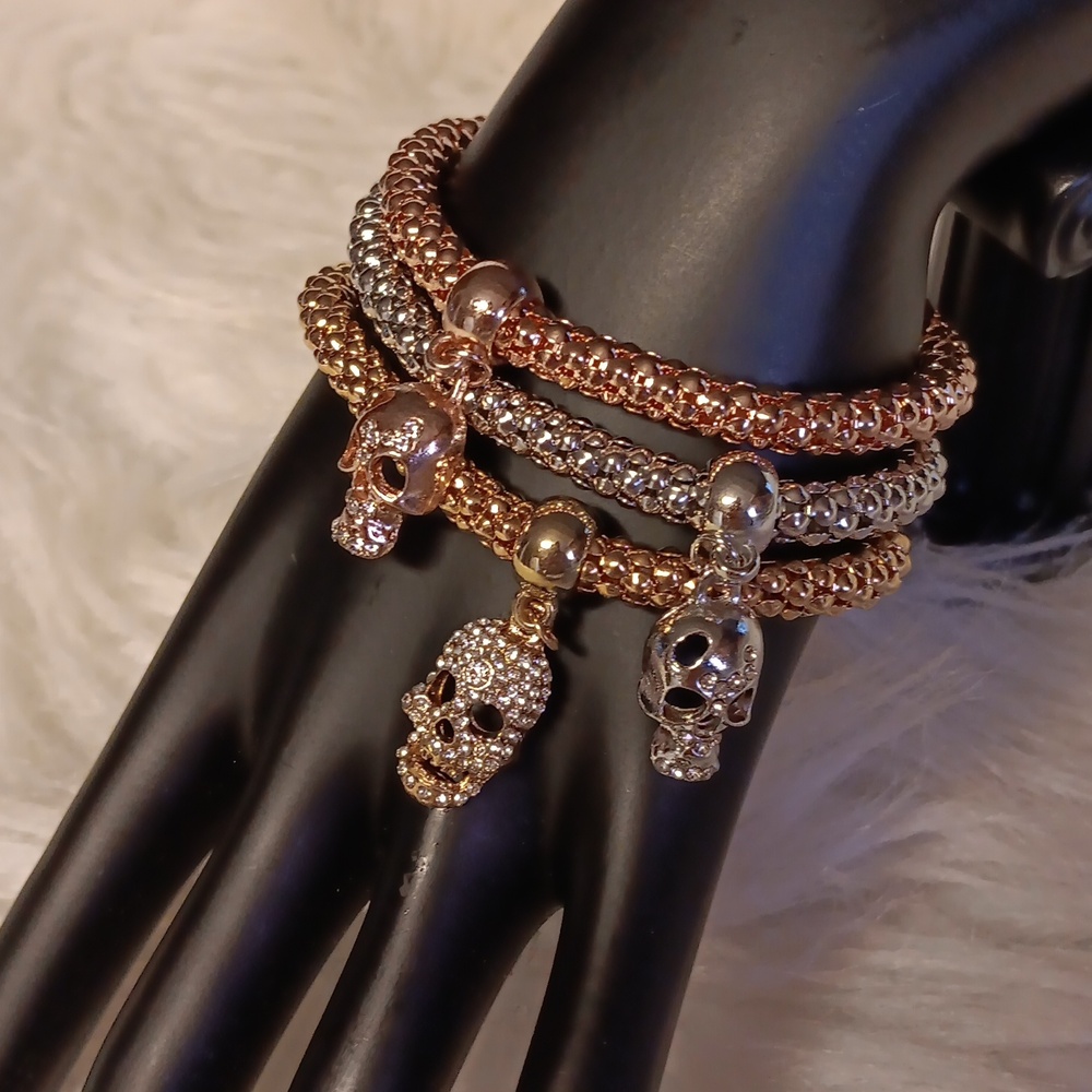 THREE PIECE SPARKLING STONE SKULL CHARM BRACELET